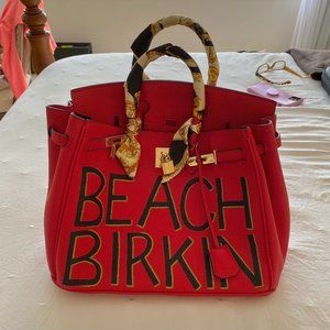Red statement bag